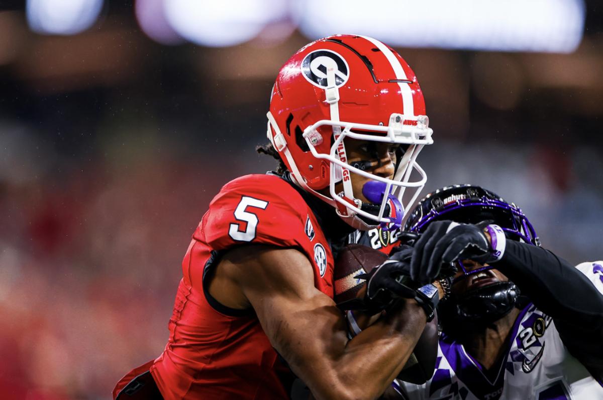 Wide receiver AD Mitchell catches a touchdown in Georgia's 65-7 victory over TCU in the 2023 National Championship credit: Tony Walsh/UGAA